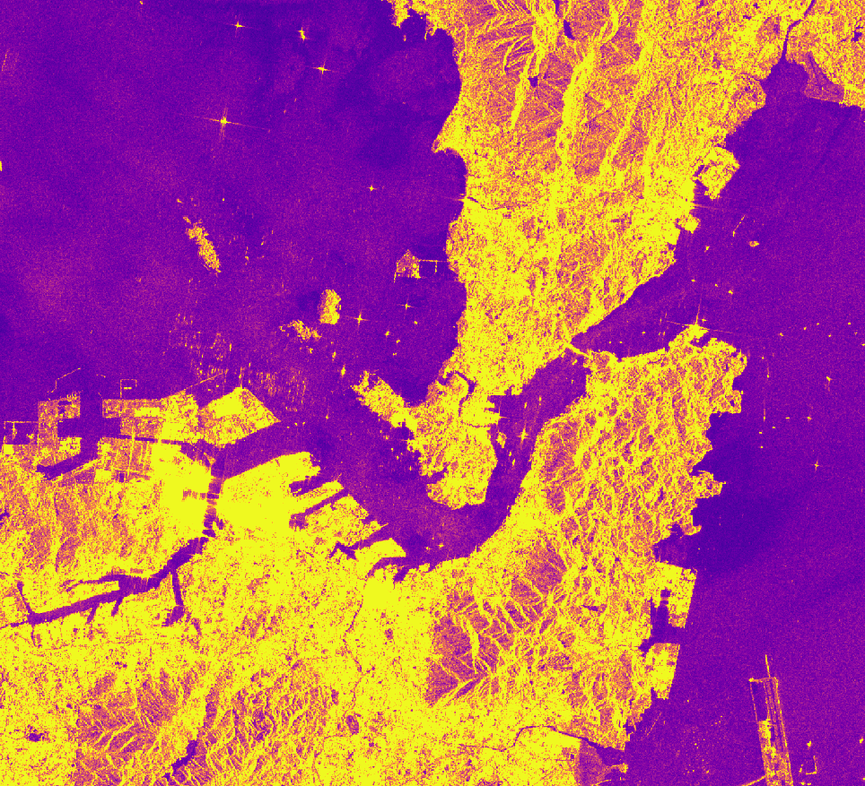 An aerial image depicting land in yellow, water in magenta. Sentinel-1 GRD False Color Image, Kitakyushu, Japan, April 20, 2023